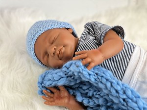 Layla-asleep-full-limbs-fully-assembled-weighted-with-magnets-002